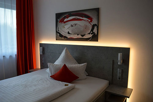 backlit headboard hotel room